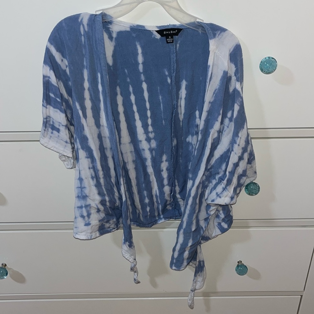 A small white and blue cover-up